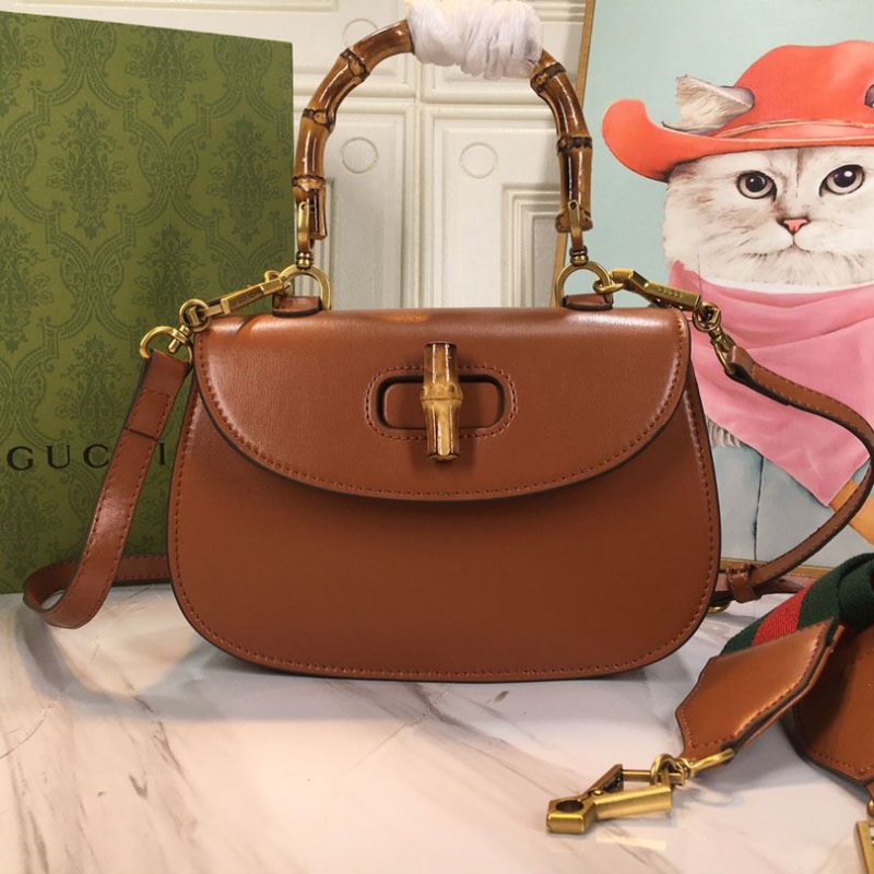 G*u*i top handle bags